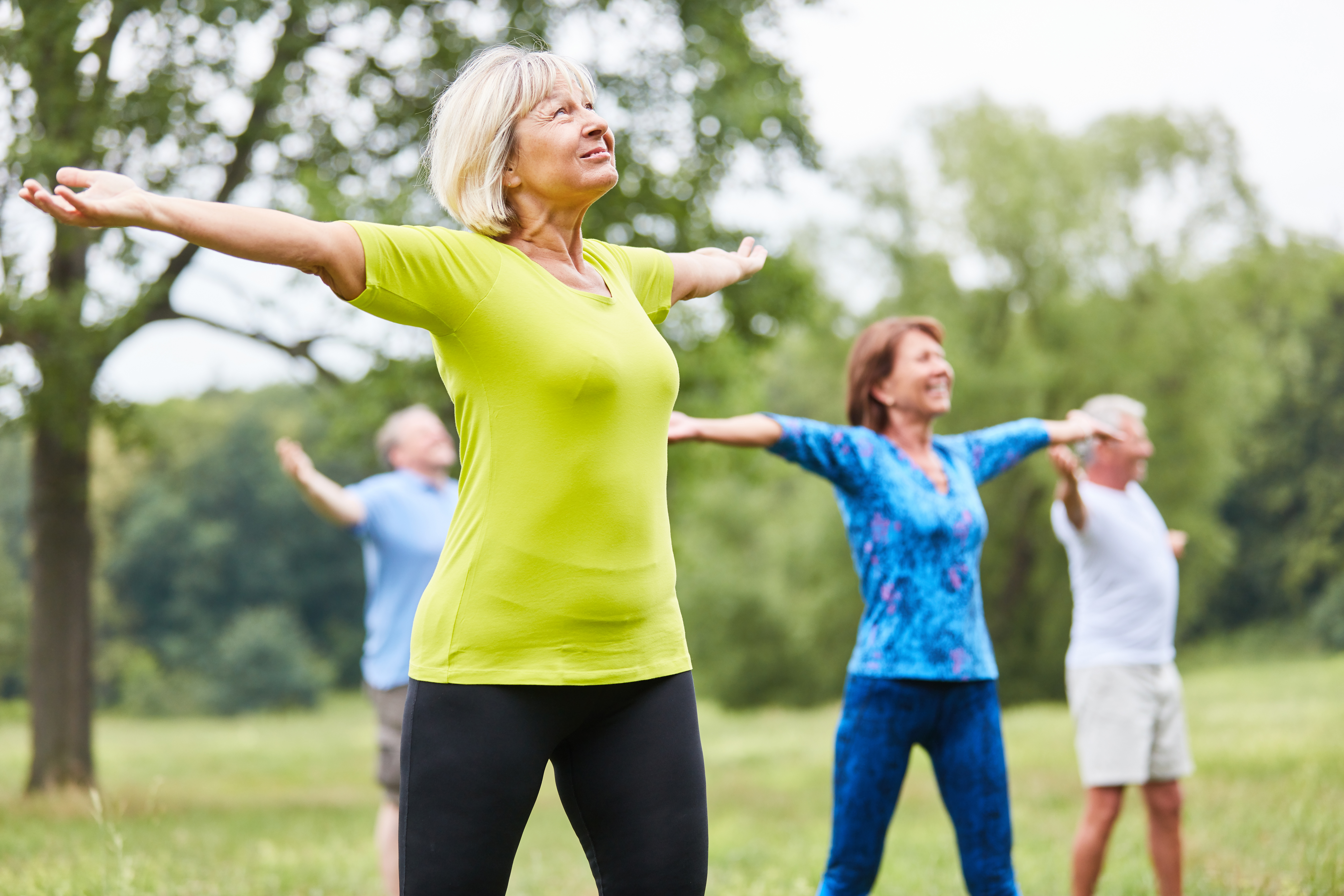 Seniors in a yoga or gym class Seniors in a yoga or gym class